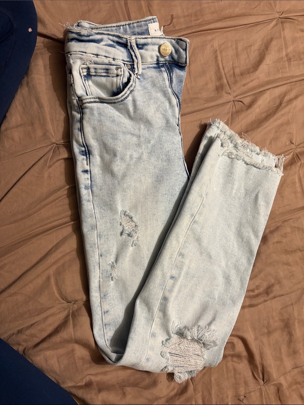 Light Blue Skinny Jeans with Frayed Hem and Knee Rips